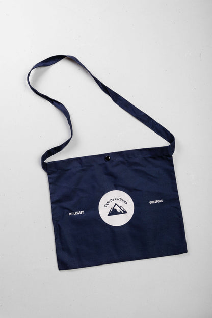 Willing Coffee Navy Musette Bag - an essential for cyclists on the go, perfect for storing snacks and essentials during your long rides